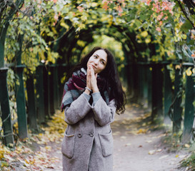 young woman in autumn park