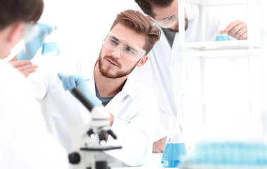 Wall Mural - background image science team in the lab