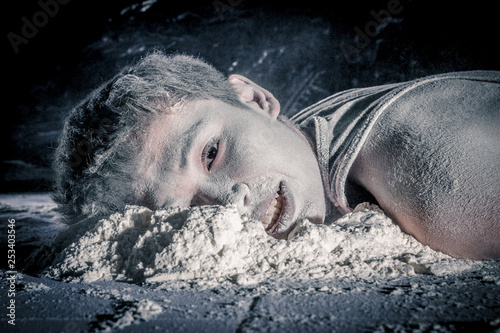Dead Shinese Guy Lying On The Floor With A Dirty Face In White