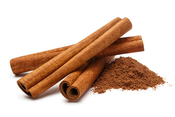 Wall Mural - Cinnamon sticks and powder, isolated on white background