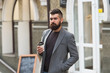 © be free - Make this day with coffee. Bearded man enjoying morning coffee. Drinking his cup first thing in morning. Businessman in hipster style holding takeaway coffee. Hipster with paper cup walking in city