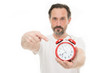© be free - Time management. Personal schedule and daily regime. Alarm clock morning time. Time management skills. Man bearded mature guy hold clock isolated on white. Man with beard check what time is it