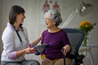 © Erickson Stock - Elderly woman at a medical check-up with her doctor.
