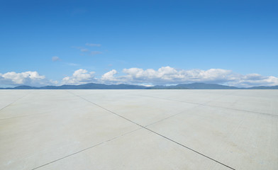 Wall Mural - empty concrete cement floor with beautiful landscape , sunny day scene .