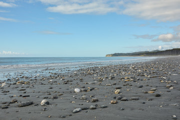 Wall Mural - Beautiful rocky beach with small stones in West Coast