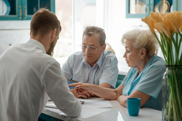 Wall Mural - Family discussing about finances