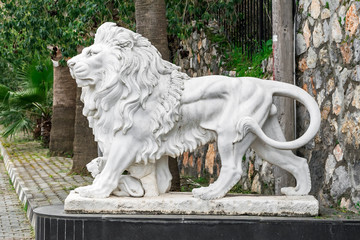 City sculpture of a lion and a lion cub at the entrance. Local landmark