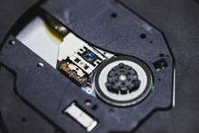 Laser Head For Cd Or Dvd Player.Close Up Of A DVD Player Ejecting Disc