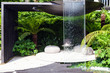 Patio area with a waterfall in a beautiful garden