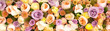 Background of orange, violet roses and chrysanthemum