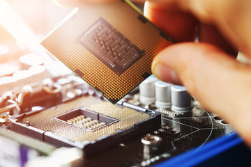 Electronic engineer of computer technology. Maintenance computer cpu hardware upgrade of motherboard component. Pc repair, technician and industry support.