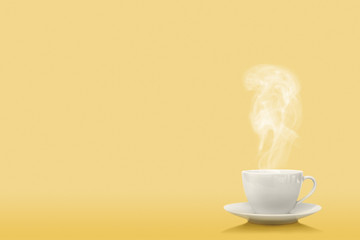 Wall Mural - a cup of coffee on the yellow background