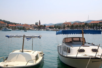 Two small boats in the port of Vela Luka, on island Korcula, Croatia. 