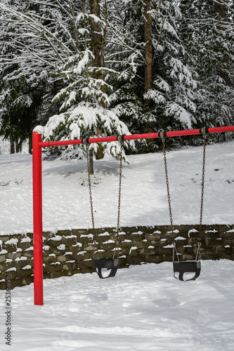 Classic Swing Set In A Public Park Red Support Stand And