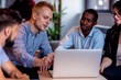 © FS-Stock - Teamwork concept.Young creative coworkers working with new startup project in modern office.Group of people analyze data on desktop computer.