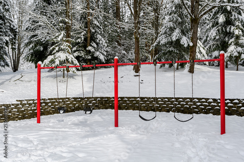 Classic Swing Set In A Public Park Red Support Stand And