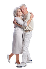 Portrait of happy senior couple posing on white background