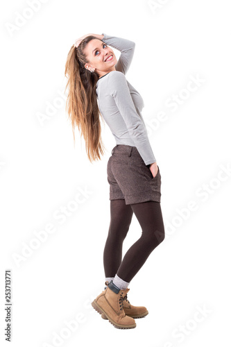 Cute Lovely Hipster Girl With Blonde Hair Posing And Holding Hair