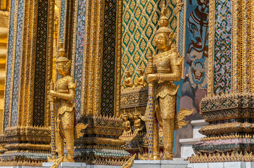 Wall Mural - Mythical beast statue guarding the Phra Mondop library building on the grounds of the Grand Palace Bangkok Thailand.