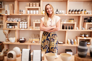 portrait of female owner of independent cosmetics store