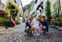 Beautiful Family, Walking On The Streets Of Clovelly, Nice Old Village In The Heart Of Devonshire