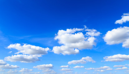 Wall Mural - Blue sky background and white clouds in sunny day