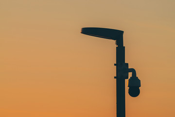 Wall Mural - special lantern against light pollution at sunset close-up. warm natural background of sky sunrise g