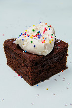 Chocolate Cake With Whipped Cream And Sprinkles
