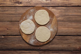 Fototapeta Mapy - Preparation of dough for pies. Rustic cuisine.