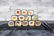 Stacked Sushi On Slate Slab, Chop Sticks