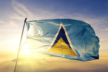 Saint Lucia Flag Waving On The Top Sunrise Mist Fog