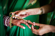 Indian bride mehndi with jewelry at a wedding