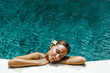 © Alena Ozerova - Woman relaxing in swimming pool