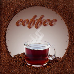 Wall Mural - coffee cup with coffee text in dark roasted coffee beans and ground coffee powder in frame  closeup