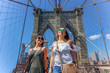 Girls having fun at New York, Brooklyn Bridge