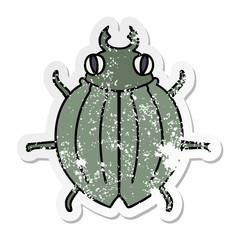 distressed sticker of a quirky hand drawn cartoon beetle