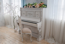 White Vintage Piano In A Bright Room