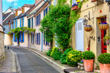 Fototapete - Old street with old houses in a small town Chartres, France