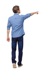 Canvas Print - Back view of a man walking with a pointing hand.