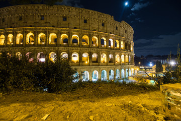 Wall Mural - The Colosseum, the world famous landmark in Rome. Night view