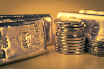 Wall Mural - Gold bars and stack of gold coins. Background for finance banking concept. Trade in precious metals.