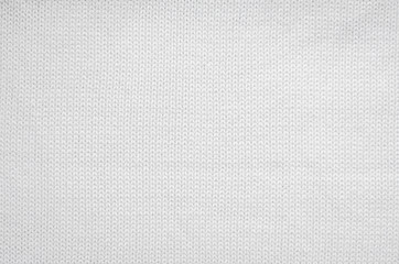 white knitted fabric background. the texture of the white wool fabric.