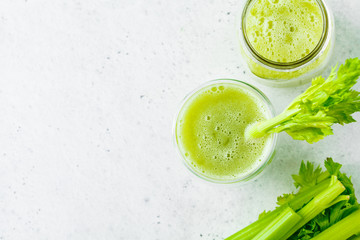 Wall Mural - Green detox celery juice in a glass.