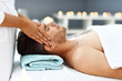 © Kalim - Handsome man having massage in spa salon