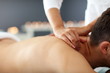© Kalim - Handsome man having massage in spa salon