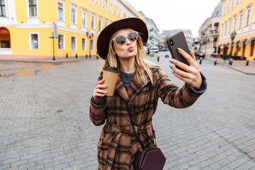 Wall Mural - Beautiful young stylish blonde woman