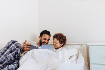 Father and son spending time together at home