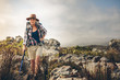 © Jacob Lund - Senior woman on an adventurous hiking trip