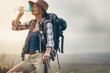 © Jacob Lund - Portrait of a female hiker drinking water