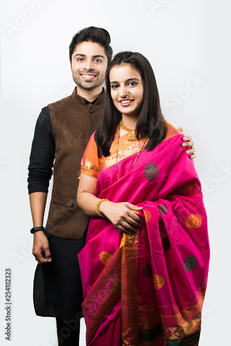 Indian Young Couple Standing Isolated While Wearing Traditional Cloths Celebrating Festivals Buy This Stock Photo And Explore Similar Images At Adobe Stock Adobe Stock indian young couple standing isolated